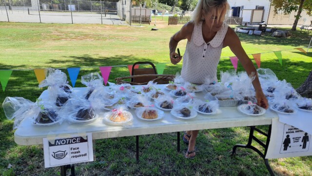 Robin Pack sets up her beautifully presented goods from the #TinyBakeshop.